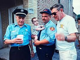 The late Harry (Razz) DiAndrea, Michael (Doc) DiAndrea with daughter Amy Nicole and the late Anthony (Doodles) DiAndrea, Jr. at the Berwyn Fire Company 100th anniversary celebration in 1994. The DiAndrea family has a long history of generational service to the T-E community.