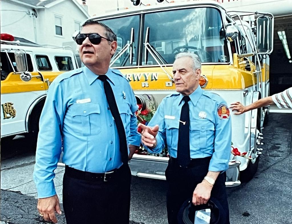 Anthony (Doodles) DiAndrea, Jr. and Harry (Razz) DiAndrea in front of the Berwyn fire station at the 100th anniversary celebration in 1994.